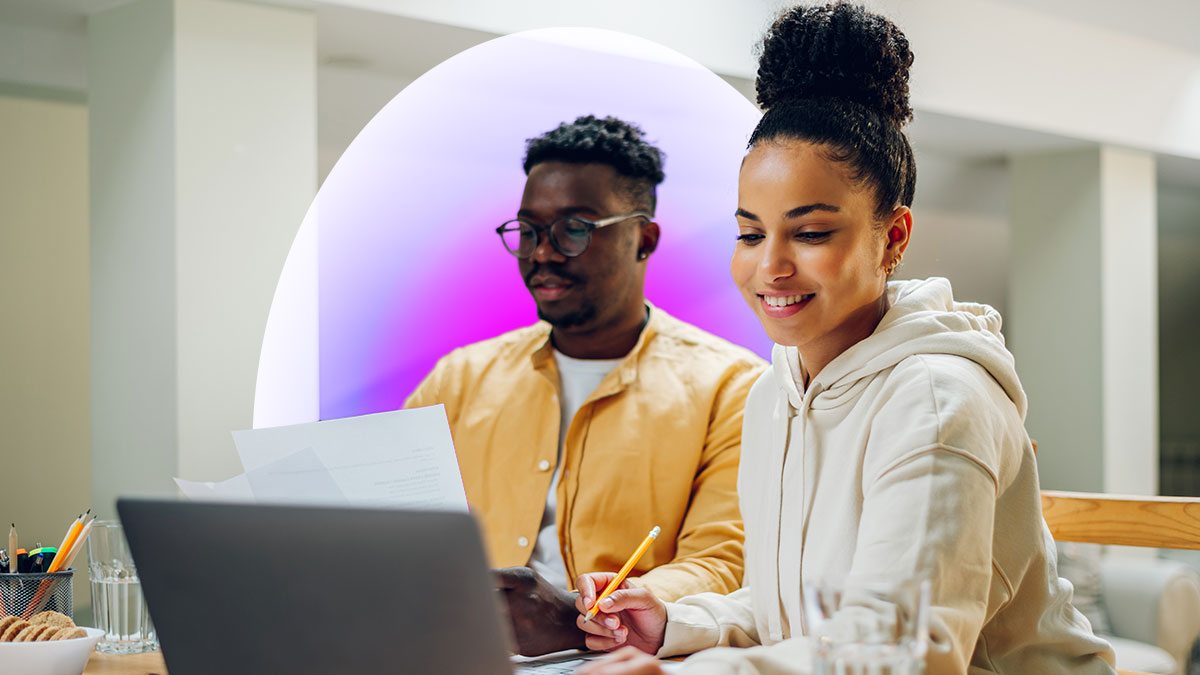 Man and woman sitting and smiling